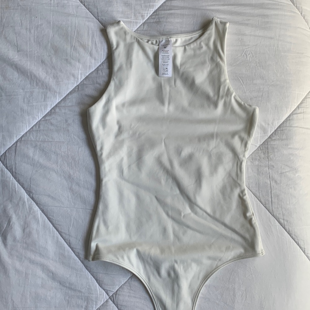 White sleeveless Paragon Bodysuit